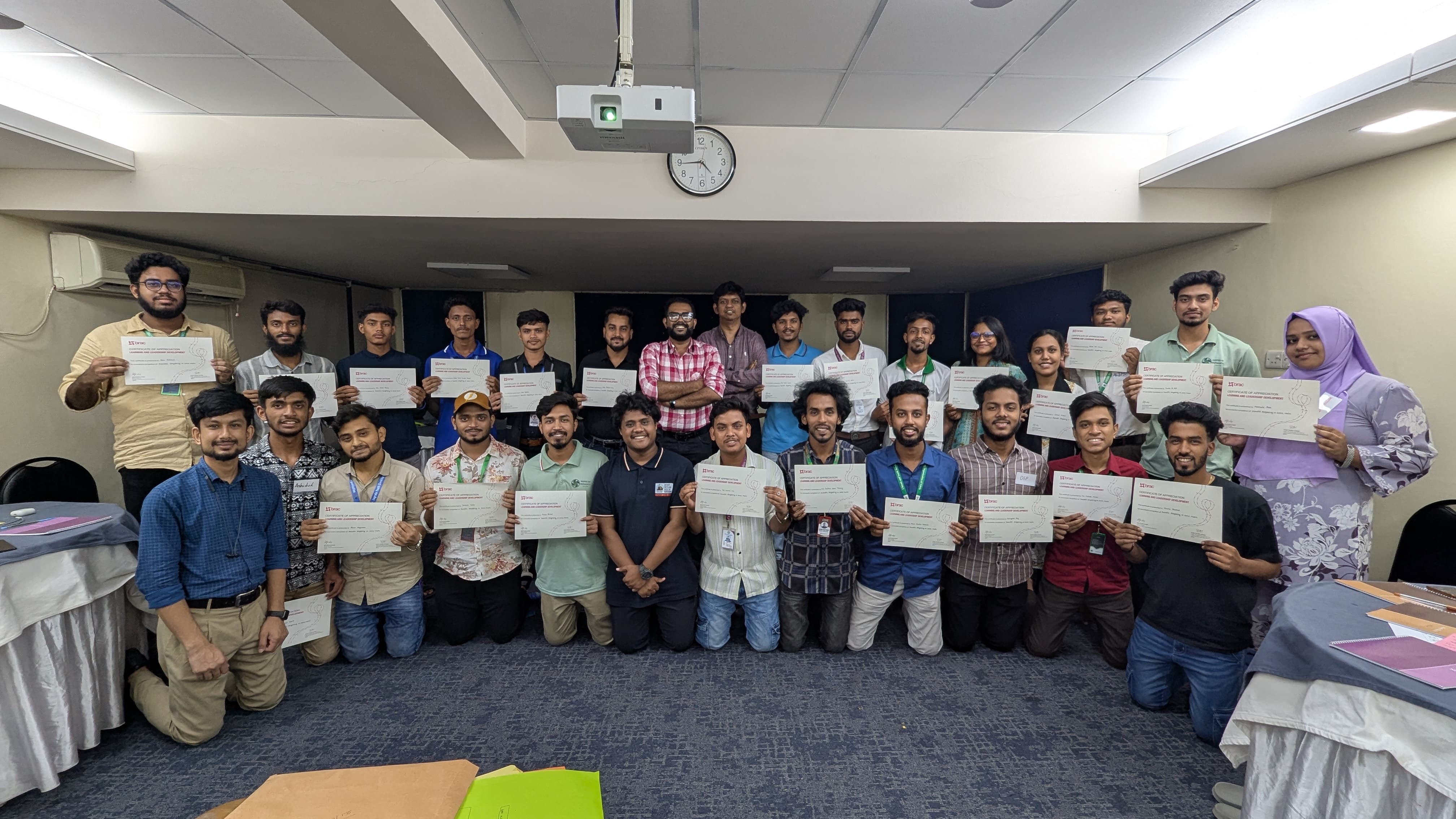 Acknowledging the achievements and dedication of participants, marking the successful completion of their training journey.